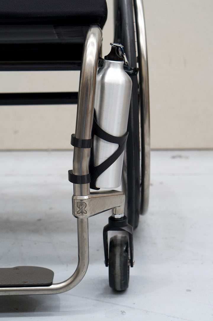 Carbon bottle cage mounted on wheelchair frame