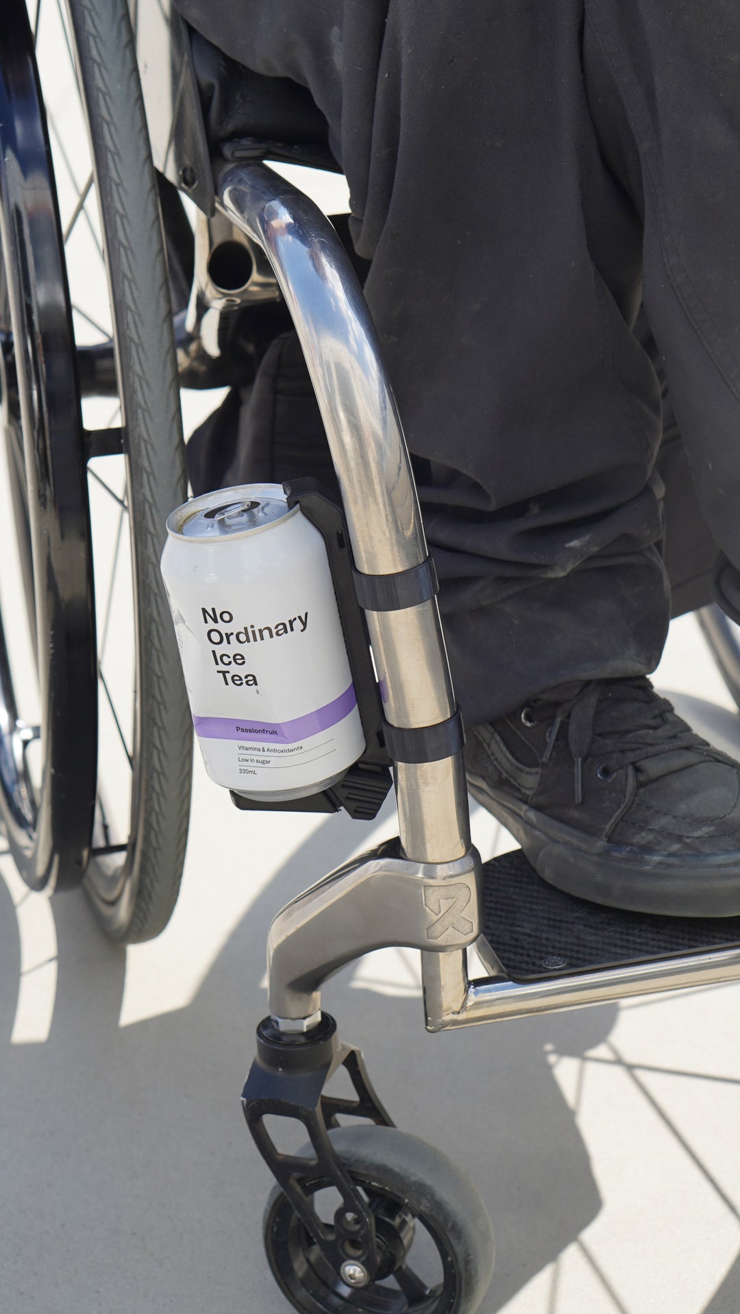 Rove can holder mounted on wheelchair armrest